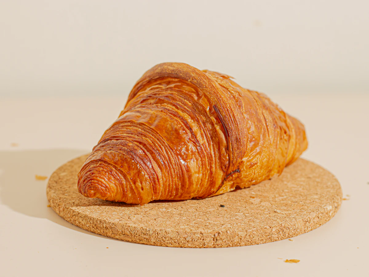 Golden butter croissant on a plate