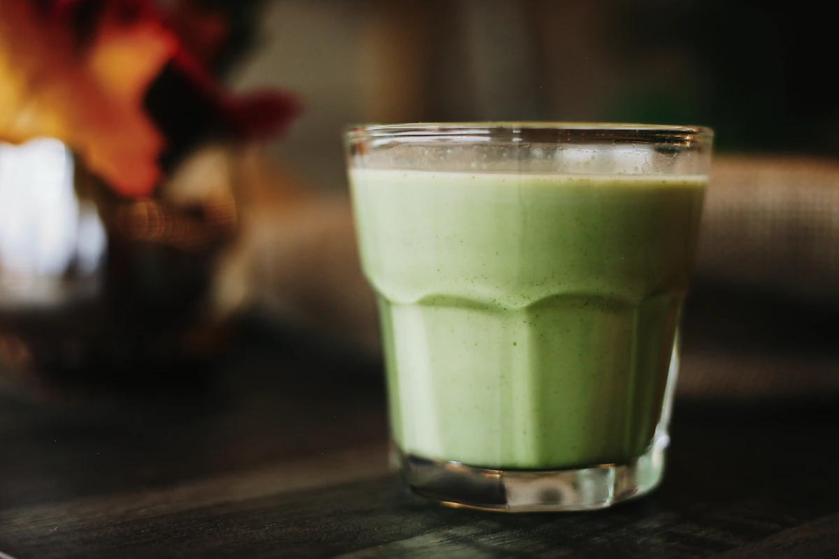 Iced matcha latte in a clear cup, like the drinks on the Starbucks matcha menu